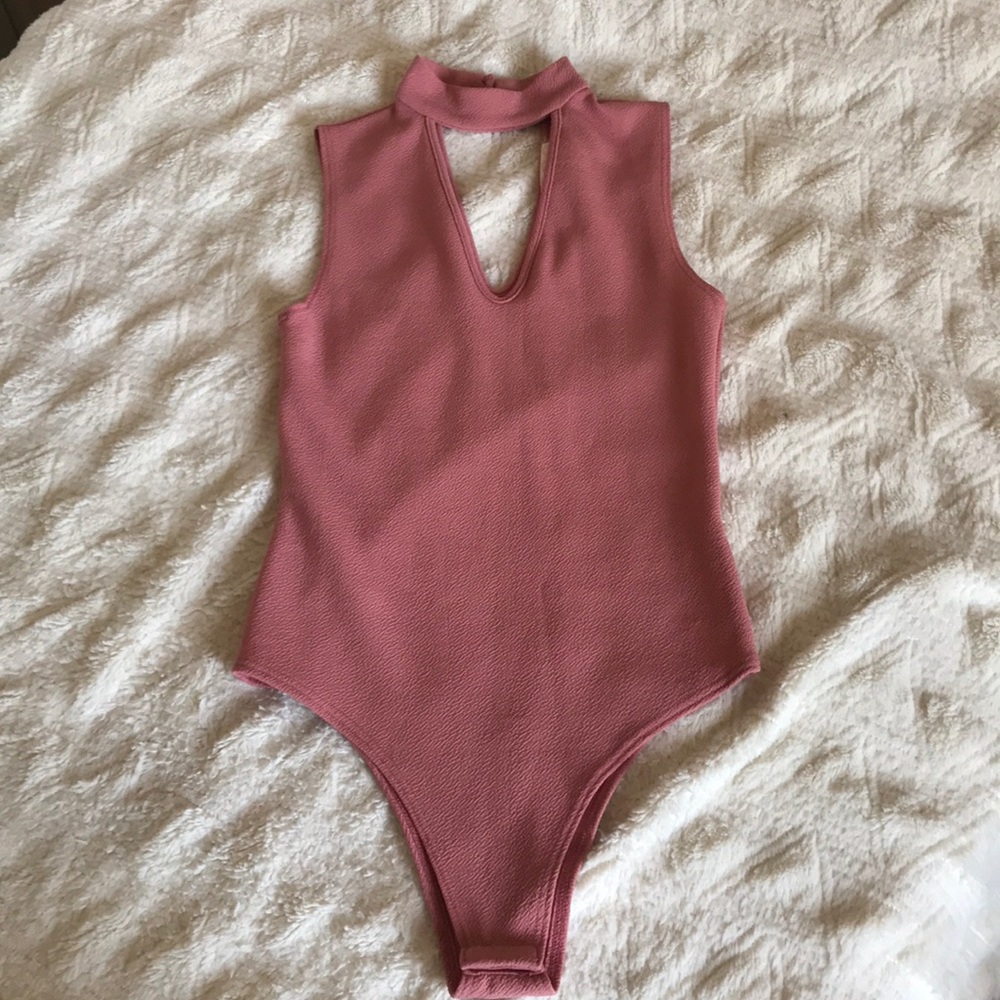 Pink body suit